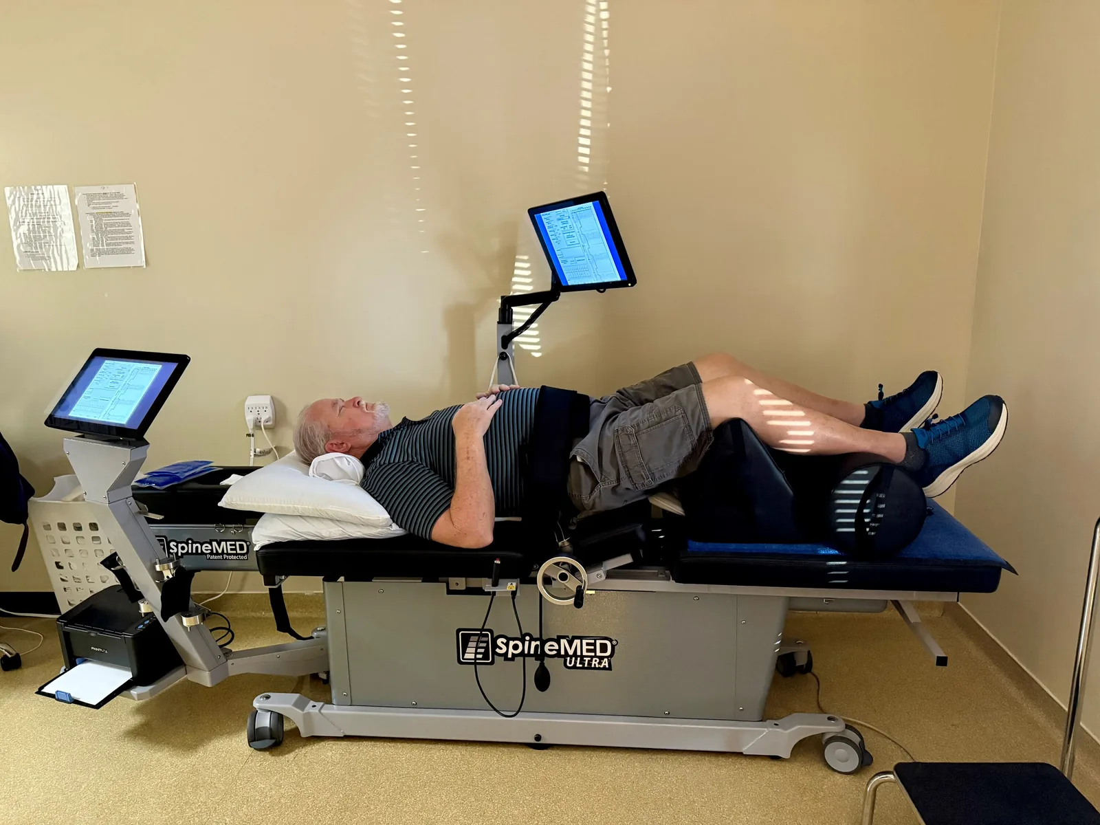 A patient positioned on the SpineMED spinal decompression table