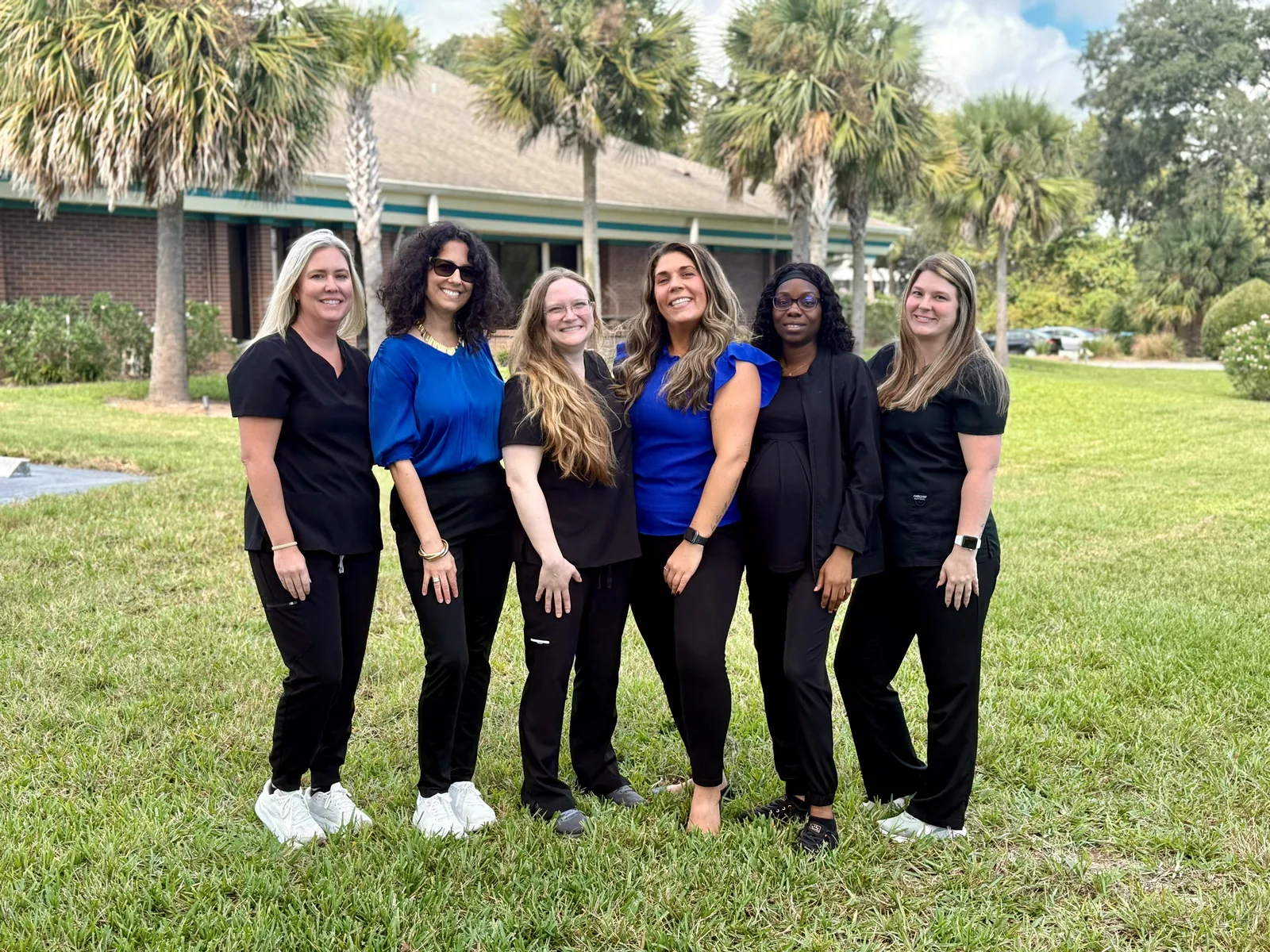 The Neuropathy & Healing Center team outside the practice